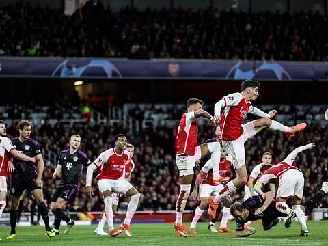 Arsenal's midfielder Kai Havertz jumps to clear the ball during the Champions League quarter-final first-leg match against Bayern Munich at the Arsenal Stadium on April 9.