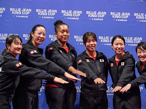 (From left) Shuko Aoyama, Ena Shibahara, Naomi Osaka, Mai Hontama, Nao Hibino and head coach Ai Sugiyama of Japan pose for photographs during the draw ceremony prior to the Billie Jean King Cup qualifier tie against Kazakhstan at Ariake Coliseum in Tokyo on Thursday.
