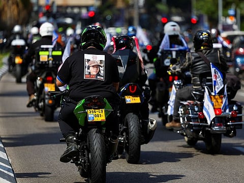 People participate in 'Ride for Hope', an event where people ride motorcycles across the country in support of hostages kidnapped in the deadly October 7 attack on Israel by the Palestinian Islamist group Hamas from Gaza, as the conflict between Israel and Hamas continues, in Tel Aviv, Israel, April 12, 2024.