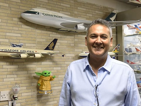 Kalpesh Mehta explaining about his hobby of model plane collections at his house in Mankhool-Dubai .