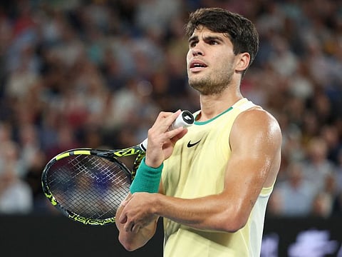 Spain's Carlos Alcaraz reacts after a point against Germany's Alexander Zverev during their men's singles quarter-final match of the Australian Open on January 24.