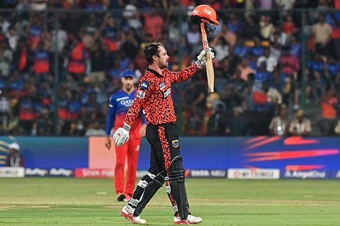 Sunrisers Hyderabad's Travis Head celebrates after scoring a century during the Indian Premier League match against Royal Challengers Bengaluru at the M Chinnaswamy Stadium in Bengaluru on Monday.