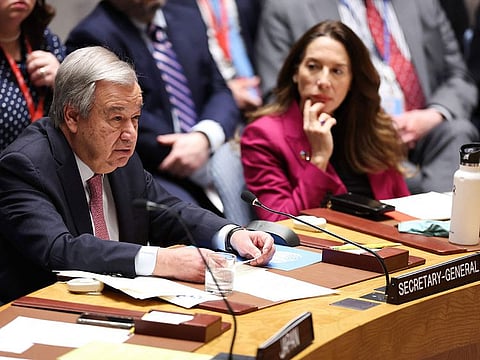Secretary-General of the United Nations Antonio Guterres (L) delivers opening remarks during a UN Security Council meeting on the situation in the Middle East, including Iran's recent attack against Israel, at UN headquarters in New York City on April 14, 2024.