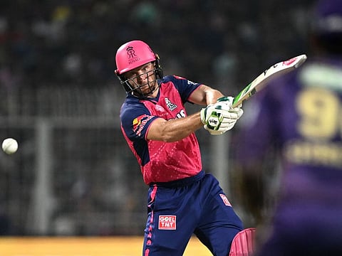 Rajasthan Royals’ Jos Buttler plays a shot during the Indian Premier League Twenty20 cricket match against Kolkata Knight Riders at the Eden Gardens in Kolkata on April 16, 2024. His unbeaten ton helped Rajasthan record their fifth win in six matches and keep the lead in the point table this season.