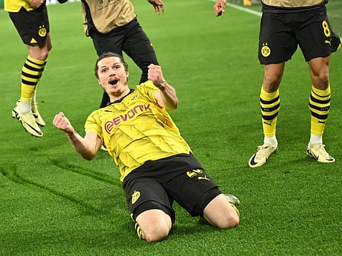 Dortmund midfielder Marcel Sabitzer celebrates after scoring his team's fourth goal during the Uefa Champions League quarter-final second leg against Atletico Madrid on Tuesday.