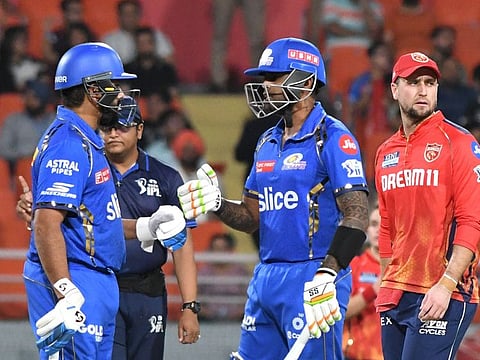 Mumbai Indians' Rohit Sharma (left) and Suryakumar Yadav during the Indian Premier League Twenty20 cricket match against Punjab Kings at the Maharaja Yadavindra Singh International Cricket Stadium in Mohali on Thursday.