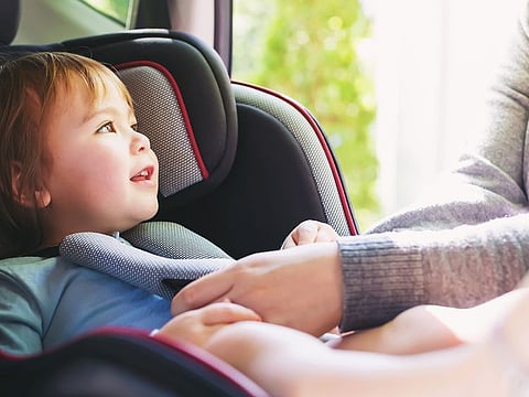 In 2017, the UAE enacted a law that requires all passengers to wear seatbelts at all times. For children under four, a designated child seat is mandatory and children under 10 cannot ride in the front seat. Picture used for illustrative purposes only.