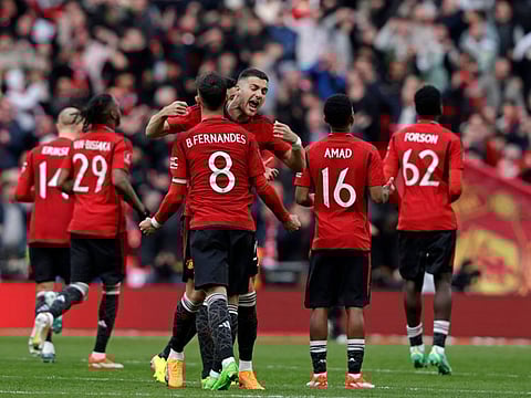 Manchester United's players celebrate after the shoot-out in the English FA Cup semi-final football match against Coventry City.