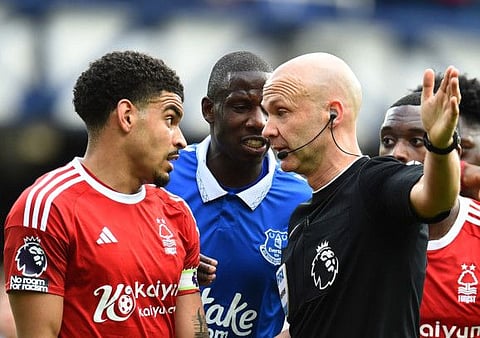 Nottingham Forest's Morgan Gibbs-White remonstrates with referee Anthony Taylor during a Premier League match against Everton at Goodison Park on Sunday.