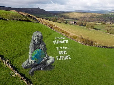 The artwork, bearing the message 'Vote for Climate, Vote for Our Future', was created to coincide with Earth Day 2024.