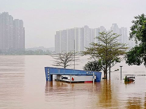 A submerged building at a flooded park after heavy rains in Qingyaun, in southern China's Guangdong province.