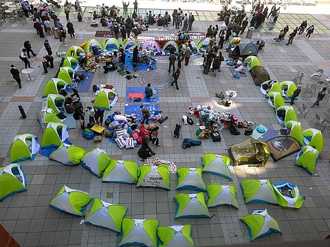 New York University students set up a "Liberated Zone" tent encampment in Gould Plaza at NYU Stern School of Business on April 22, 2024 in New York City.