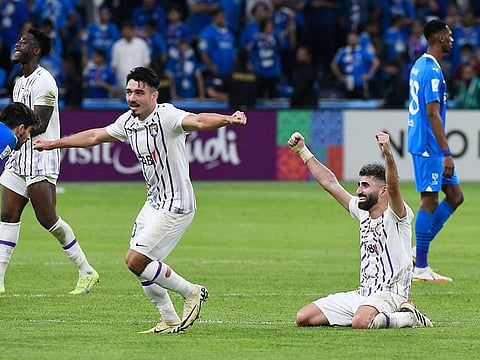 Al Ain's Matias Palacios and Yahia Nader celebrate after winning the AFC Champions League semi-finals against Al Hilal on Tuesday.