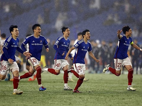 Yokohama F Marinos players celebrate winning the penalty shootout to qualify for the finals during the Asian Champions League semi-final second leg match against Ulsan Hyundai at Nissan Stadium on Wednesday.