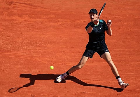 Italy's Jannik Sinner plays a forehand return to Greece's Stefanos Tsitsipas during their Monte Carlo ATP Masters Series Tournament semi-final match on the Rainier III court at the Monte Carlo Country Club on April 13.