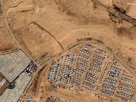 This handout satellite image courtesy of Maxar Technologies shows tent camps for displaced Palestinians in Rafah in the southern Gaza Strip on April 7, 2024.