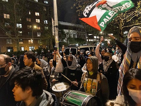 Pro-Palestinian supporters rally outside Columbia University on April 23, 2024 in New York City. In response to recent campus unrest and anxieties regarding Jewish student safety, Columbia University President Minouche Shafik announced a shift to online learning for Monday. She further urged faculty and staff to prioritize remote work.