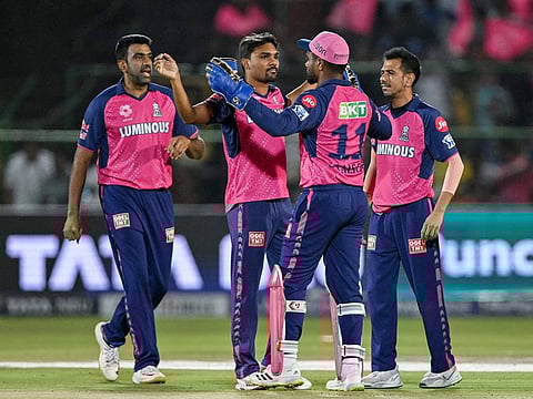 Rajasthan Royals’ Sandeep Sharma (second left) celebrates with teammates after taking the wicket of Mumbai Indians’ Suryakumar Yadav during the Indian Premier League Twenty20 cricket match in Jaipur on April 22, 2024. Rajasthan are ahead in the race for the knockout stage with seven wins in eight matches.
