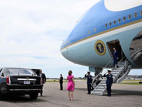 US President Joe Biden steps off of Air Force One as he arrives at Tampa International Airport in Tampa, Florida.