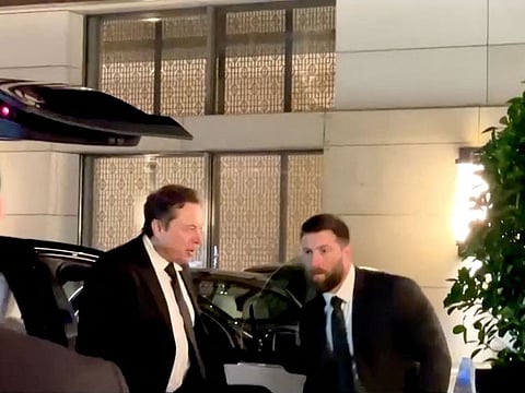 Tesla CEO Elon Musk steps out of a vehicle, during his visit to China, in Beijing,