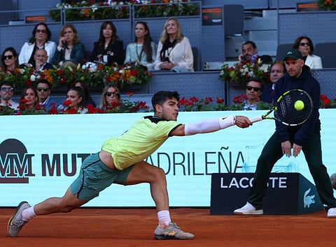 Spain's Carlos Alcaraz returns the ball to Germany's Jan-Lennard Struff during the 2024 ATP Tour Madrid Open tournament round of 16 tennis match at Caja Magica in Madrid on Tuesday.