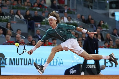 Russia's Andrey Rublev returns the ball to Spain's Carlos Alcaraz during the 2024 ATP Tour Madrid Open tournament quarter-final tennis match at Caja Magica in Madrid on Wednesday.