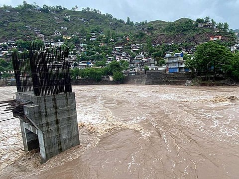A general view of an overflowing Jhelum River after heavy rainfall in Muzaffarabad in Pakistan-administered Kashmir on April 29, 2024.