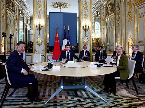 From left: Chinese President Xi Jinping, France's President Emmanuel Macron, and European Commission President Ursula von der Leyen hold a trilateral meeting at the Elysee Palace in Paris, on May 6, 2024.