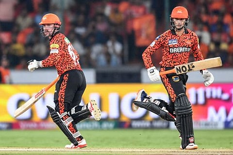 Sunrisers Hyderabad's Travis Head (left) and Abhishek Sharma run between the wickets during the Indian Premier League (IPL) Twenty20 cricket match against Lucknow Super Giants at the Rajiv Gandhi International Stadium in Hyderabad on Wednesday.