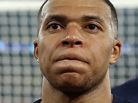 Paris Saint-Germain's French forward Kylian Mbappe reacts at the end of the Uefa Champions League semi-final second leg football match against Borussia Dortmund, at the Parc des Princes stadium in Paris on Tuesday.
