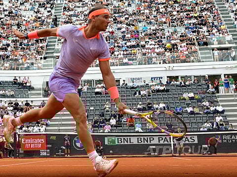 Spain's Rafael Nadal hits a return to Belgium's Zizou Bergs at the Men's ATP Rome Open tennis tournament at Foro Italico in Rome on Thursday.