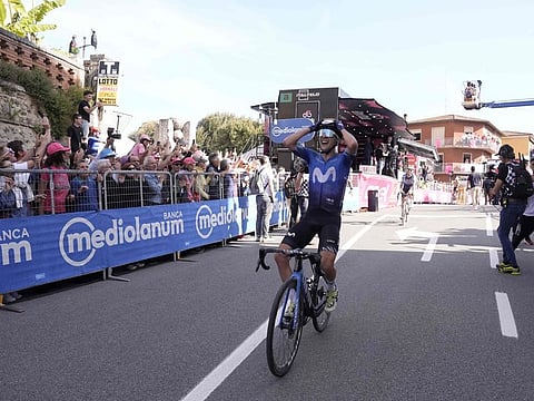 Team Movistar's Spanish rider Pelayo Sanchez celebrates after crossing the finish line to win the 6th stage of the 107th Giro d'Italia cycling race, 180 km between Torre del lago Puccini in Viareggio and Rapolano Terme, on Thursday.