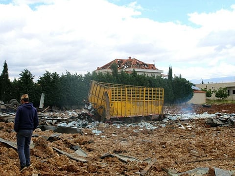 A man inspects the scene of an overnight Israeli air strike that targeted an area near the Bekaa Valley city of Baalbek, around 80 kilometres from the Israel-Lebanon frontier, on May 6, 2024.