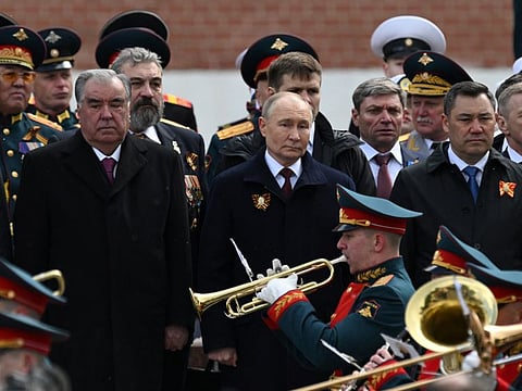 Tajik President Emomali Rakhmon, Russian President Vladimir Putin and Kyrgyz President Sadyr Japarov take part in a flower-laying ceremony at the Tomb of the Unknown Soldier on Victory Day, which marks the 79th anniversary of the victory over Nazi Germany in World War Two, in central Moscow, on May 9, 2024.