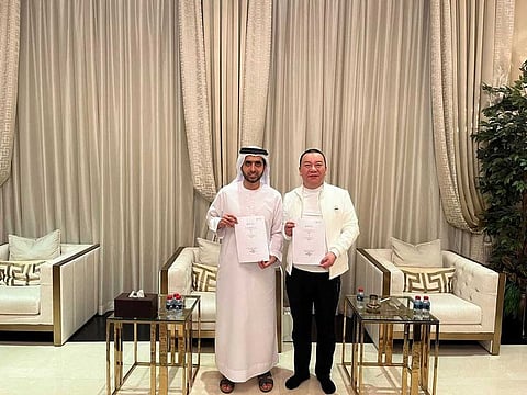 Sheikh Mohammed Bin Maktoum Bin Juma Al-Maktoum and Sun Fengquan.