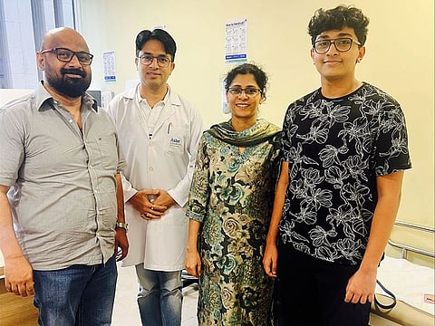 School teacher Annie Cherian with Dr Rajesh Chaudhary (second from left) and her family members at Aster Hospital Sharjah