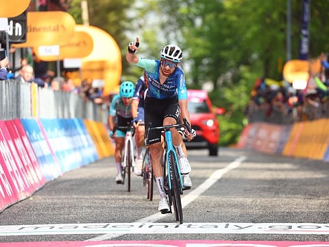 Team Decathlon AG2R's French rider Aurelien Paret-Peintre, brother of Team Decathlon AG2R's French rider Valentin Paret-Peintre crosses the finish line of the 10th stage of the 107th Giro d'Italia cycling race, 142km between Pompei and Cusano Mutri (Bocca della Selva), on Tuesday.