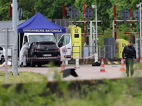 Two French prison officers were killed and two others wounded in an attack on a prison van transporting an inmate who escaped