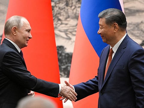 Russian President Vladimir Putin shakes hands with Chinese President Xi Jinping during a meeting in Beijing, China May 16, 2024. Sputnik/Sergei Guneev/Pool via REUTERS ATTENTION EDITORS - THIS IMAGE WAS PROVIDED BY A THIRD PARTY.