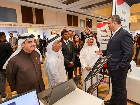 Clint Khan, Director at Y-Axis, one of the UAE's leading immigration consultants with the chief guests at Edufair 2024 in Dubai yesterday