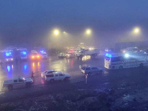 Rescue vehicles are seen following a crash of a helicopter carrying Iran's President Ebrahim Raisi.