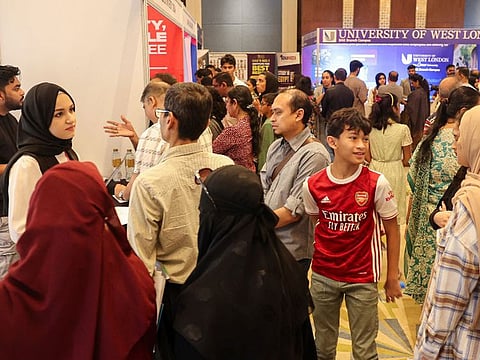 Students and parents interact with universities at Edufair to find out about courses and degrees