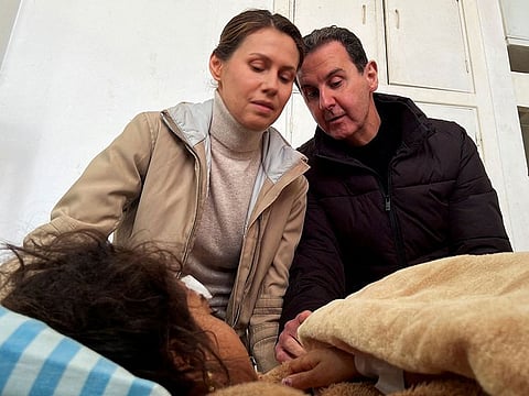Syrian President Bashar Al Assad and his wife Asma Al Assad visit injured girl Fatmeh Ahmed al-Issa who survived the earthquake, at Tishreen hospital, in the aftermath of an earthquake, in Latakia, Syria February 11, 202