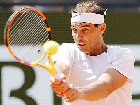 Spain's Rafael Nadal takes part in a practice session ahead of The French Open tennis tournament on Court Philippe-Chatrier at The Roland Garros Complex in Paris on May 21, 2024.
