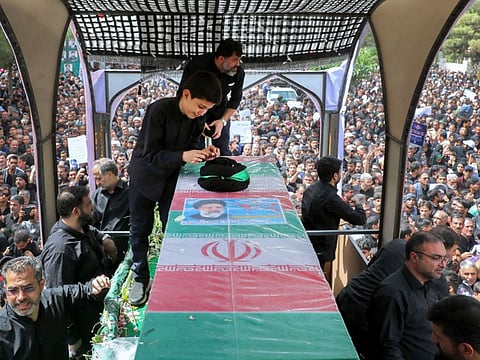 The coffin of the late Iranian president Ebrahim Raisi during a funeral procession in the eastern city of Birjand on May 23, 2024.