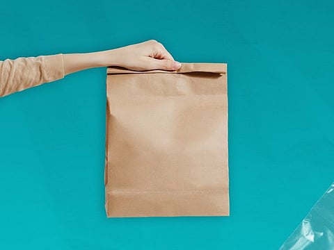 Stores are not obligated to provide free alternative bags; customers must use bags exempt from the prohibited list