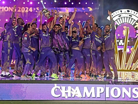 Kolkata Knight Riders’ players celebrate with the Indian Premier League trophy after winning the final against Sunrisers Hyderabad in Chennai on May 26, 2024.