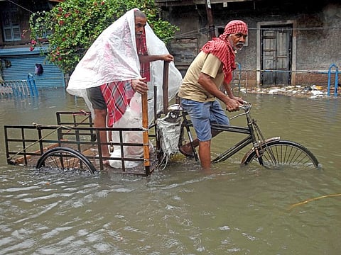 A waterlogged road in Kolkata on Monday following heavy rainfall triggered by Cyclone Remal.
