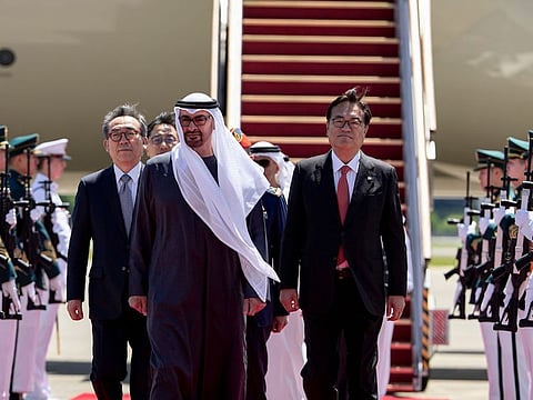President His Highness Sheikh Mohamed bin Zayed Al Nahyan (front C), arrives at Seoul Air Base commencing a state visit. Seen with Cho Tae-Yul, Minister of Foreign Affairs of the Republic of Korea (back L).