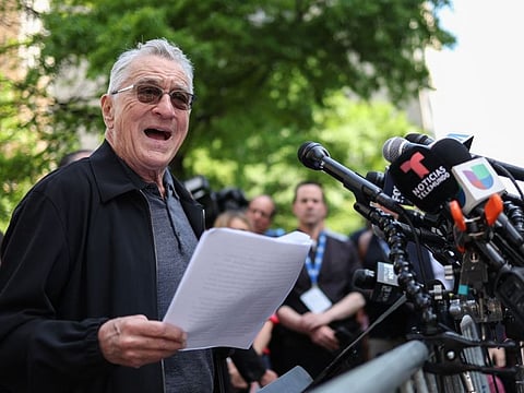 US actor Robert De Niro speaks in support of US President Joe Biden outside of Manhattan Criminal Court as former US President and Republican presidential candidate Donald Trump attends his criminal trial for allegedly covering up hush money payments in New York City, on May 28, 2024.